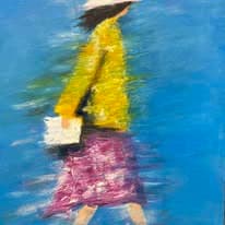 A woman in a yellow coat